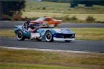 Historic blue Chevron racing at Taupō