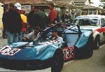 Blue Chevron number 183 on a motorsport grid