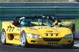 Yellow Chevron number 777 racing at Taupō